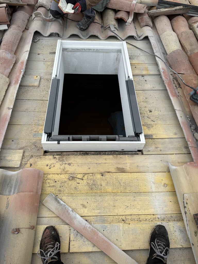 Pose d'un velux Toulousain avant